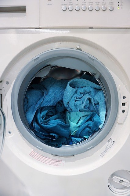clothes being washed on a combo RV washer dryer